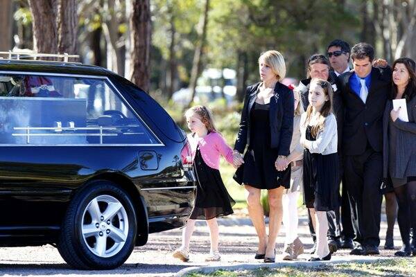 GOODBYE: John Pirona's wife Tracey and their children Lateisha and Siennah. - Picture by Dean Osland