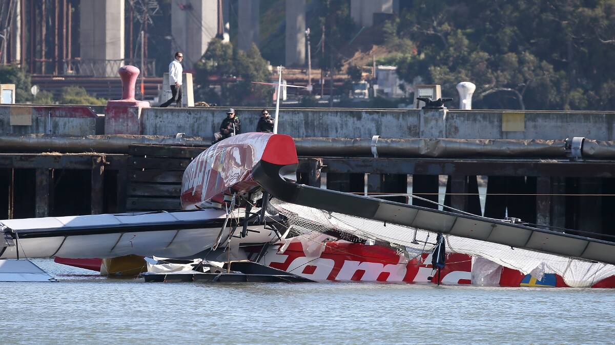The bottom of the Artemis Racing AC-72 catamaran is seen in the water at Hangar 3 at Treasure Island on May 9. Photo: GETTY IMAGES