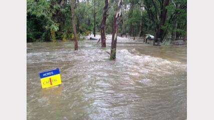 Flooding at Mandalong. Picture Shannon Weiley. 