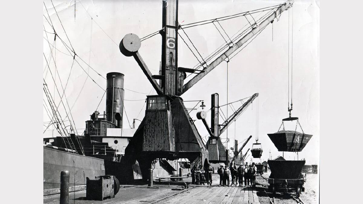 ARCHIVAL REVIVAL 1900s: Photographs from the Newcastle Herald's files. A ship is being loaded with Aberdare small coal at the Basin Wharf in 1914 