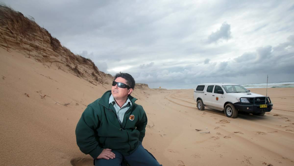 WARNING: Tony DeMamiel, of the National Parks and Wildlife Service, on Stockton Beach.  Picture: Dean Osland