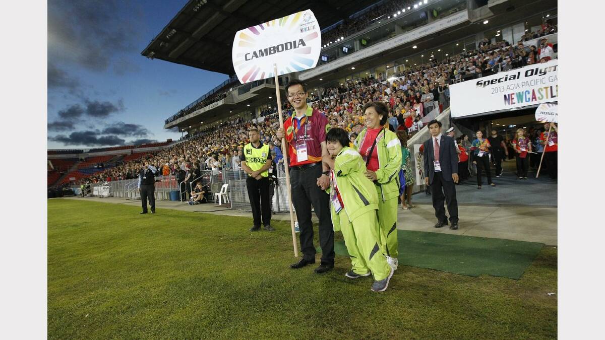 The opening ceremony of the Special Olympics on Sunday night. Athletes from Cambodia arrive at the stadium. Picture Jonathan Carroll