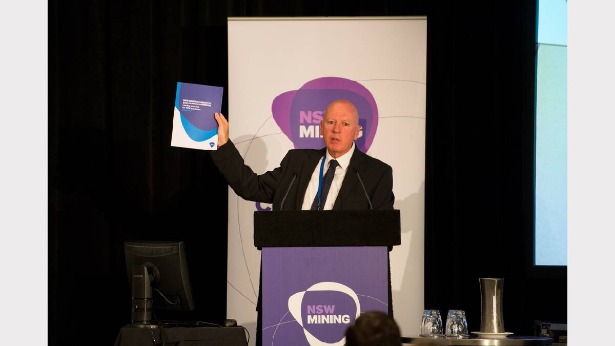 Resources and energy minister Chris Hartcher at the NSW Minerals Council conference on Monday, launching the NSW Minerals Industry Exploration Handbook.