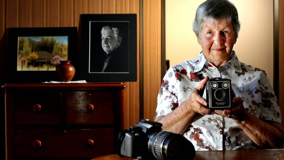 KEEN EYE: Reta Telford and her old box brownie. She recently bought her first digital camera, but prefers working in black and white, developing her own work in the darkroom.  Picture: SIMONE DE PEAK