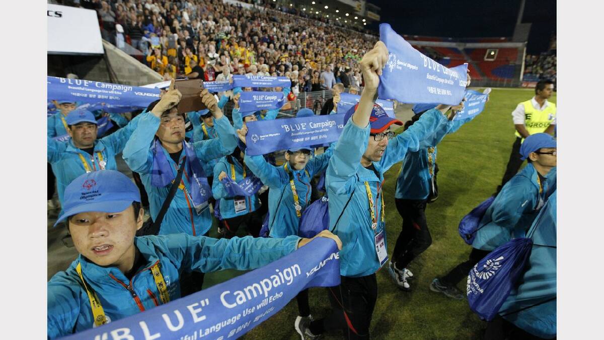 The opening ceremony of the Special Olympics on Sunday night. Athletes from Korea arrive at the stadium.  Picture Jonathan Carroll