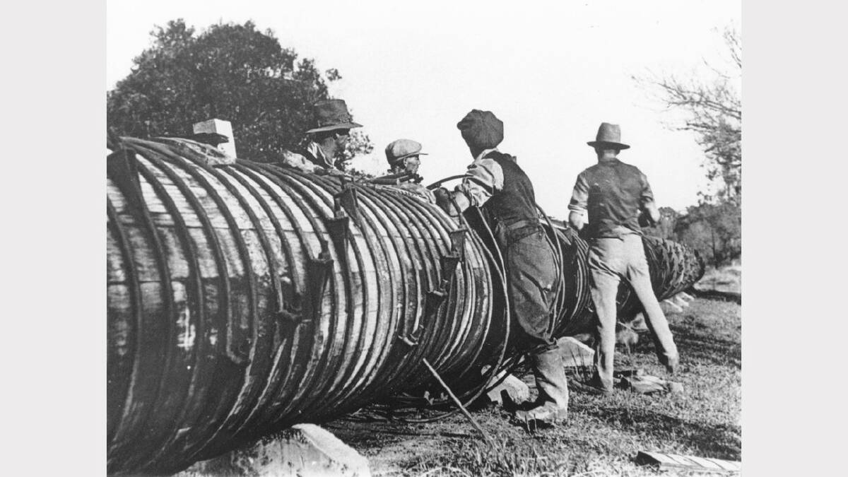 ARCHIVAL REVIVAL 1900s: Photographs from the Newcastle Herald's files. The shortage of steel in World War I led to the first 14 kilometres of the Chichester line being made of watertight, woodstave pipe. 