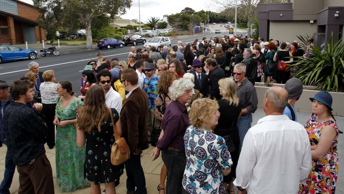 BELOVED: The mourners gathered outside the chapel.  Picture: Max Mason-Hubers