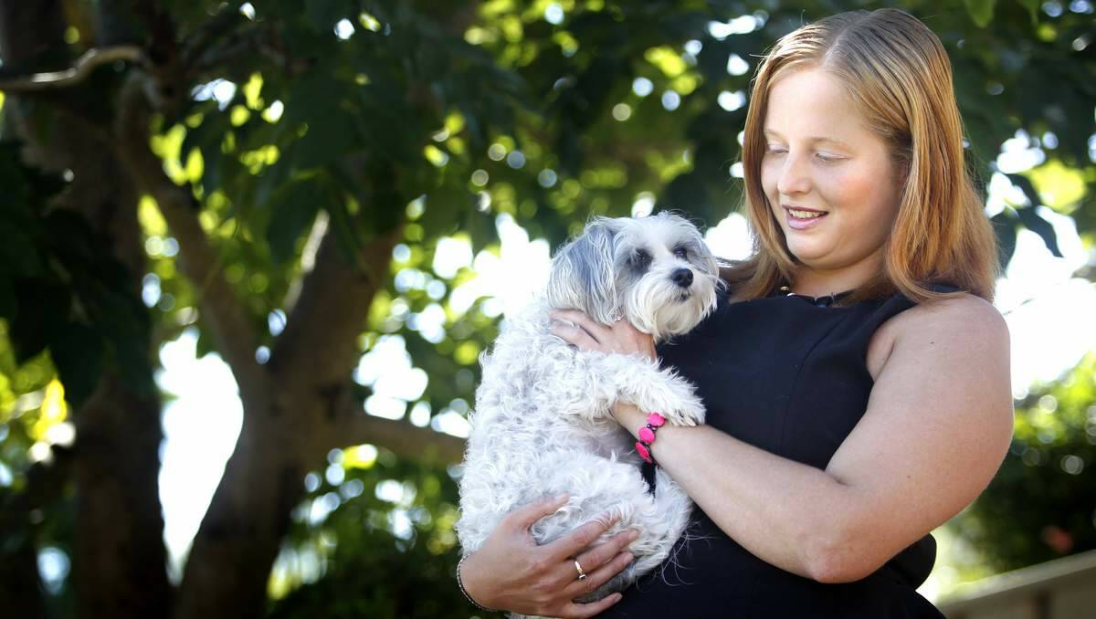 Amanda Young, with the family dog Sophie, who was a rescue dog.  Picture: Marina Neil