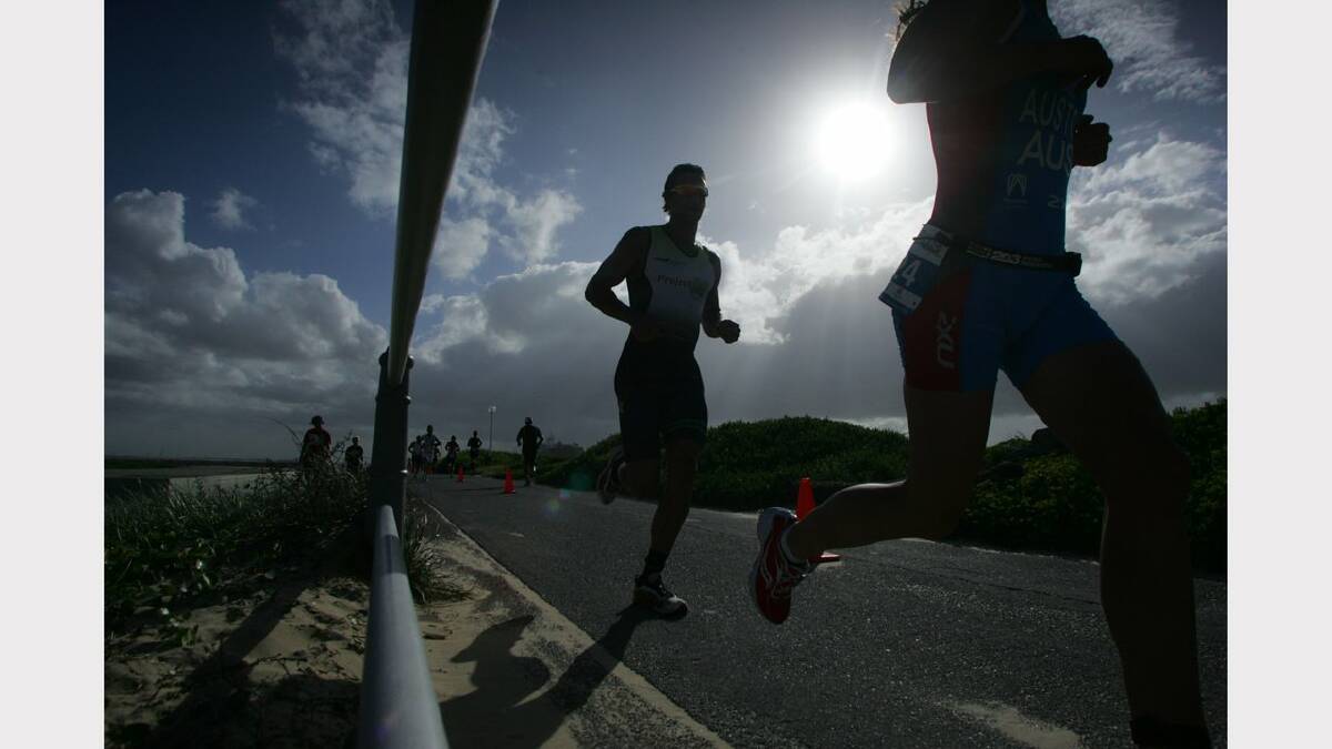 ENERGY: Action from the Sparke Helmore NBN Triathlon in Newcastle on Sunday. Picture Max Mason Hubers.