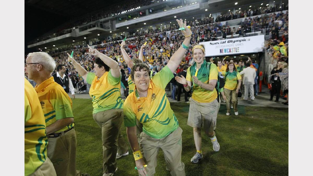 The opening ceremony of the Special Olympics on Sunday night.  Athletes from Australia arrive at the stadium. Picture Jonathan Carroll