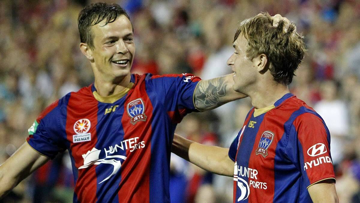 Ryan Griffiths, left, with Adam Taggart, after scoring the second goal of the Round 21 game against Melbourne Heart this month. Griffiths has been released by the Jets to play in China. Picture Jonathan Carroll 