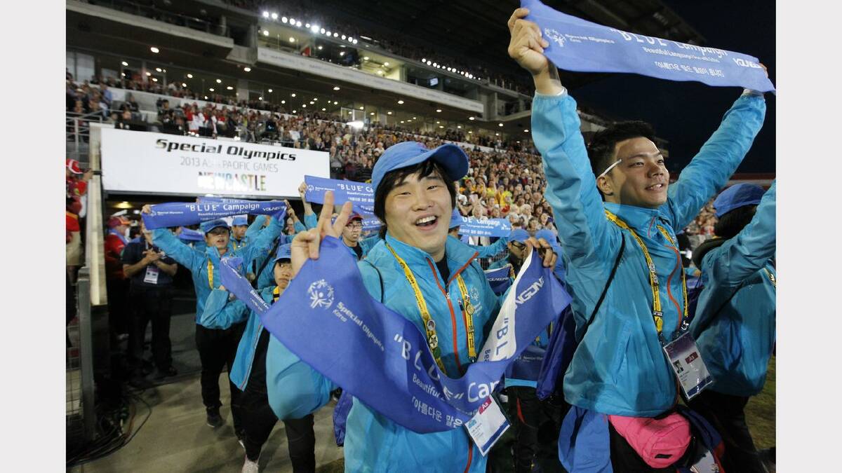 The opening ceremony of the Special Olympics on Sunday night.  Athletes from Korea arrive at the stadium. Picture Jonathan Carroll