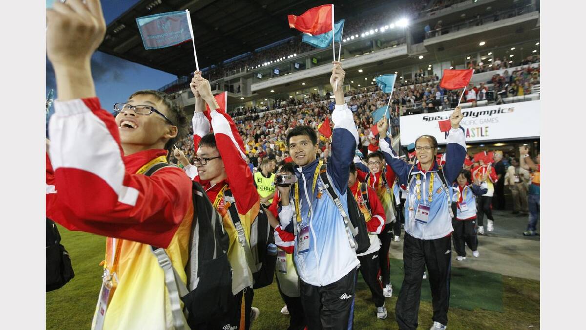 The opening ceremony of the Special Olympics on Sunday night. Athletes from Hong Kong arrive at the stadium. Picture Jonathan Carroll