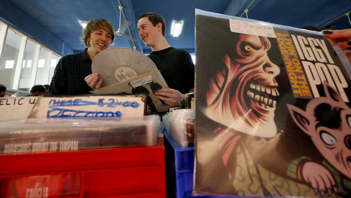 EDGY POP: Vinyl fans hunt for treasures, some costing up to $80.   Pictures: Dean Osland