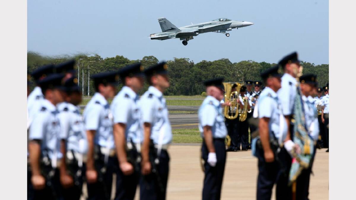 Williamtown RAAF base hosts 70th anniversary of 41, 42 and 44 wings. A Hornet fighter takes off for the fly-past.  Picture Brock Perks