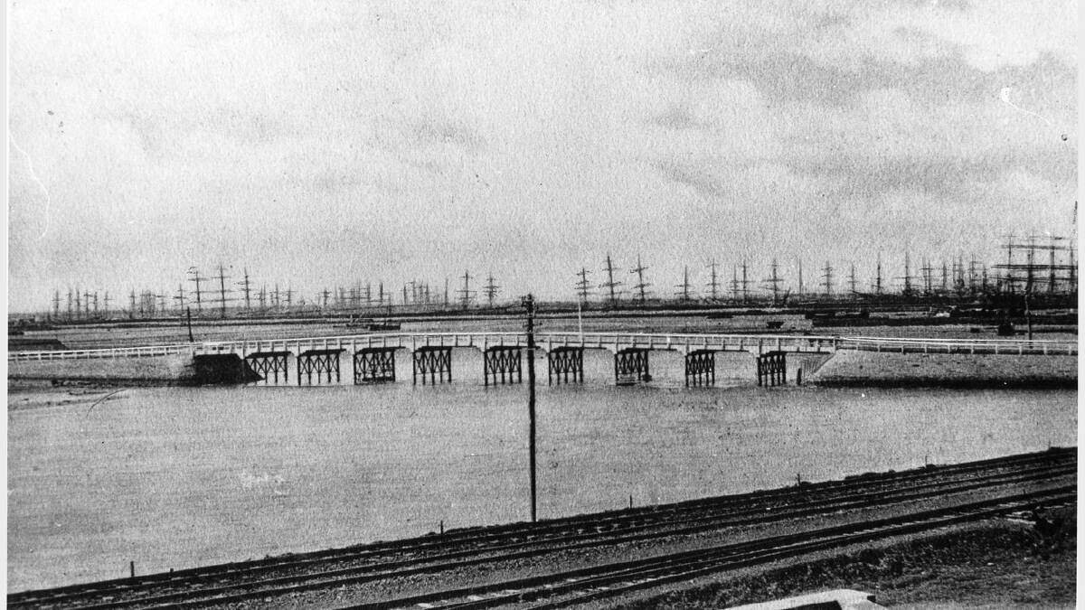 ARCHIVAL REVIVAL 1900s: Photographs from the Newcastle Herald's files. Carrington bridge from Honeysuckle to where the wheat silos now stand.