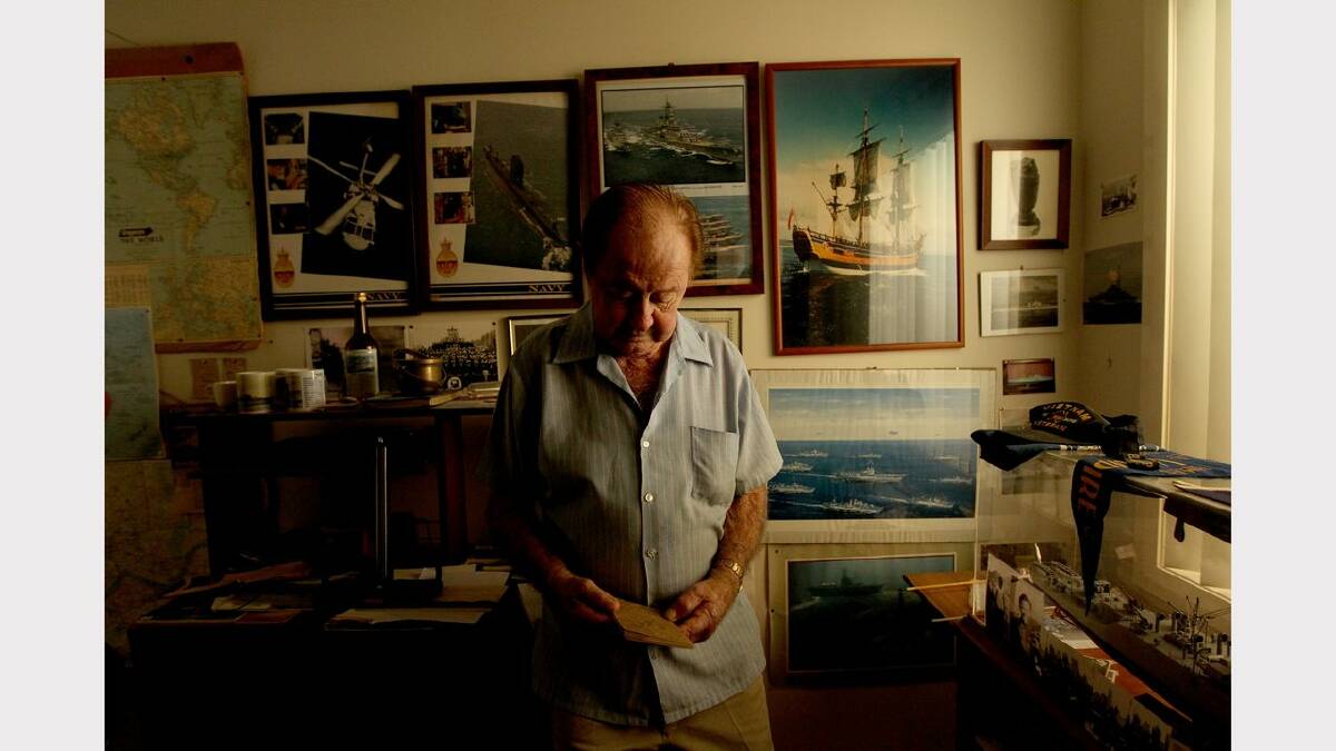  Retired Australian Navy engineer John Quinn at home in his memorabilia room. He was exposed to the Montebello nuclear test in 1952. Picture Ryan Osland 