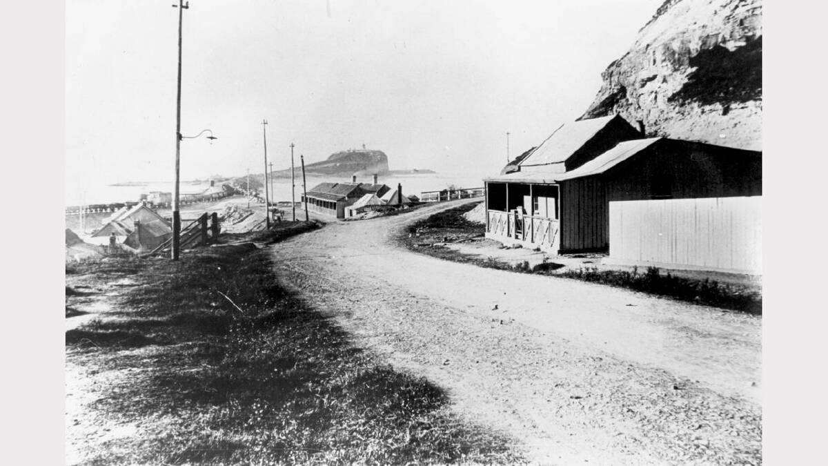 ARCHIVAL REVIVAL 1900s: Photographs from the Newcastle Herald's files. A humble cottage (at right) at the junction of Nobbys Road and Fort Drive, possibly in 1910. 