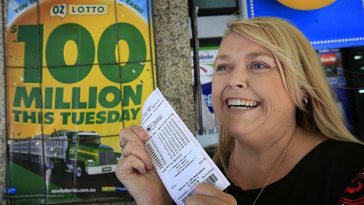HERE'S LUCK: Michelle McNeill from Aberglasslyn would pay off the house and take a holiday with her little girl if she won the big lotto prize. Picture PETER STOOP