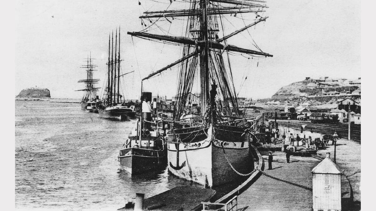 ARCHIVAL REVIVAL 1900s: Photographs from the Newcastle Herald's files. Sailing ships at Queens Wharf near traffic roundabout about 1900. 