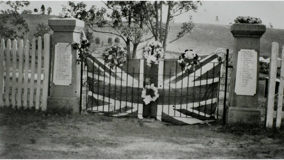 ARCHIVAL REVIVAL 1900s: Photographs from the Newcastle Herald's files. Sawyers Gully school gates in 1919 on ANZAC day.