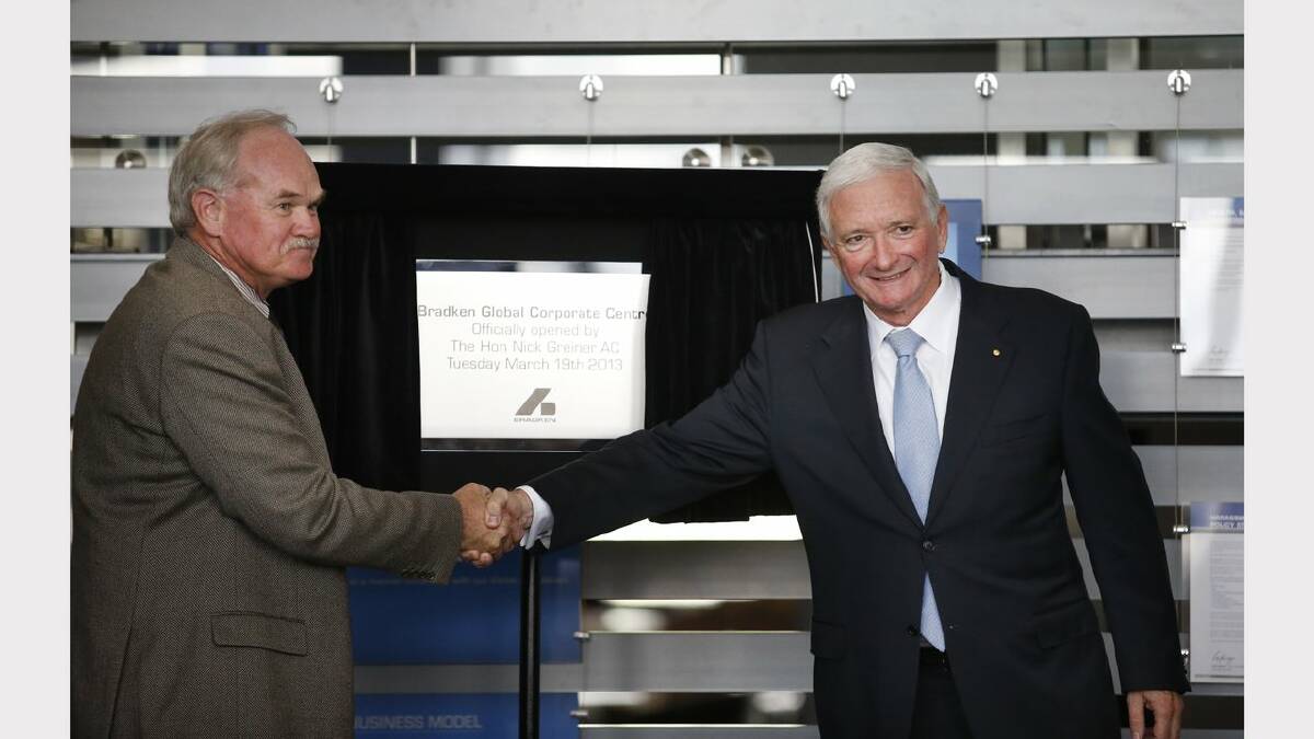 GLOBAL HQ: Infrastructure NSW chairman Nick Greiner, right, and Bradken CEO Brian Hodges, at the  launch of  the $18m new headquarters of mining and rail engineers Bradken on Tuesday at Steel River.  Picture by DEAN OSLAND