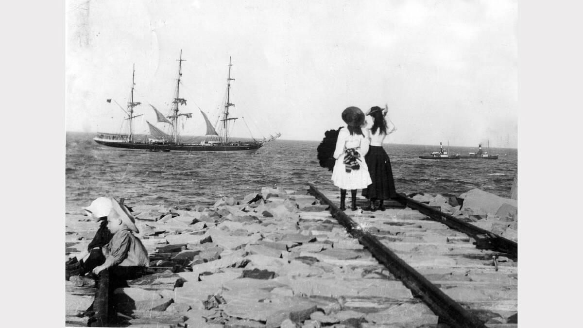ARCHIVAL REVIVAL 1900s: Photographs from the Newcastle Herald's files. Girls on Nobbys breakwater, around 1900.