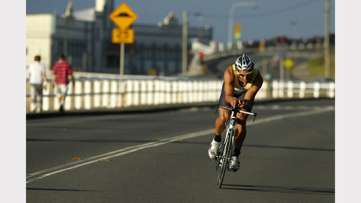 ENERGY: Action from the Sparke Helmore NBN Triathlon in Newcastle on Sunday. Winner of the Olympic Distance Triathlon race, Nathan Miller, on Shortland Esplanade during the cycling leg of the race.  Picture Max Mason Hubers.