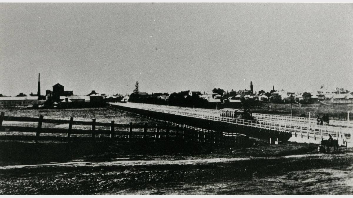 ARCHIVAL REVIVAL 1900s: Photographs from the Newcastle Herald's files. Maitland long bridge and tram, 1915.