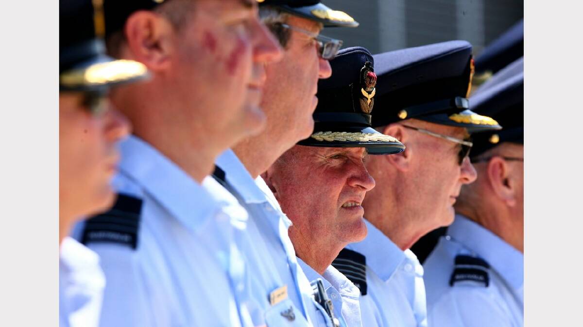Williamtown RAAF base hosts 70th anniversary of 41, 42 and 44 wings. RAAF officers watch the parade.  Picture Brock Perks