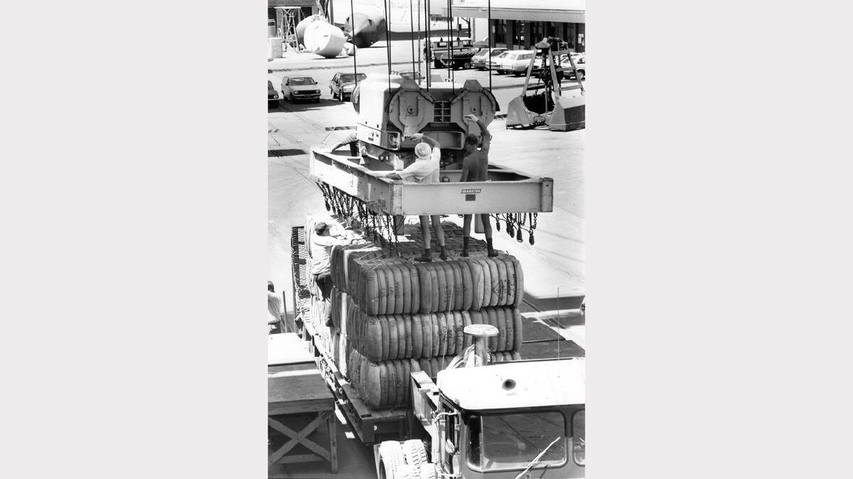 A new method launched in November 1984 to load wool bales wool bales being loaded at Western Basin No.4  onto the "Lista" Photo by Allan Jolly 