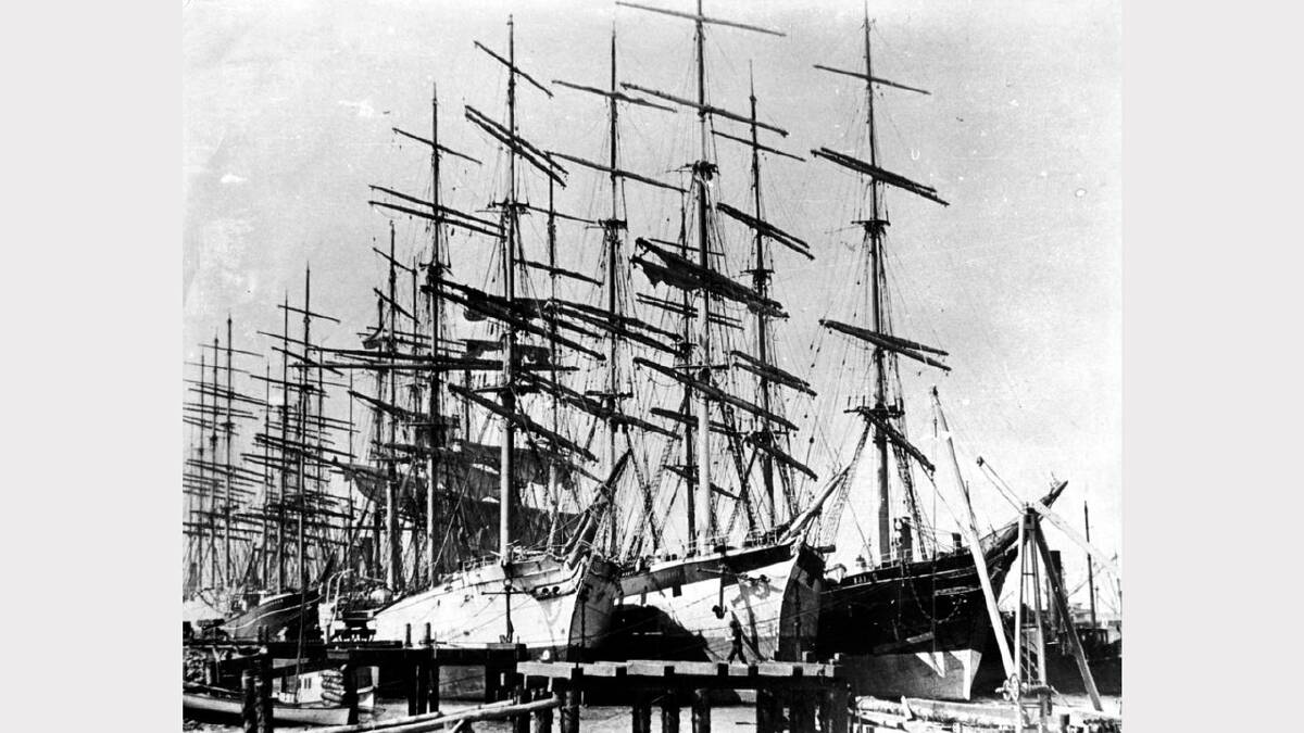 ARCHIVAL REVIVAL 1900s: Photographs from the Newcastle Herald's files. The windjammer fleet berthed three abreast at dolphins in Newcastle Harbour, circa 1900.