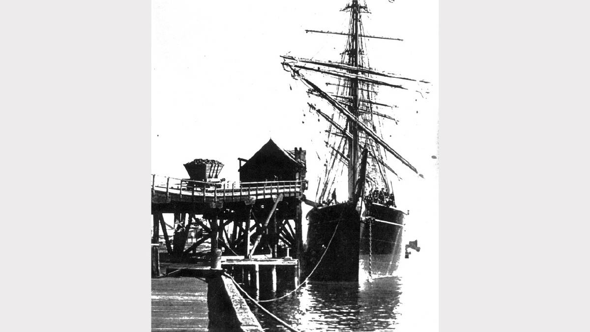 ARCHIVAL REVIVAL 1900s: Photographs from the Newcastle Herald's files. A windjammer loading coal from small, wooden coal hoppers, at Honeysuckle Wharf in 1911. 
