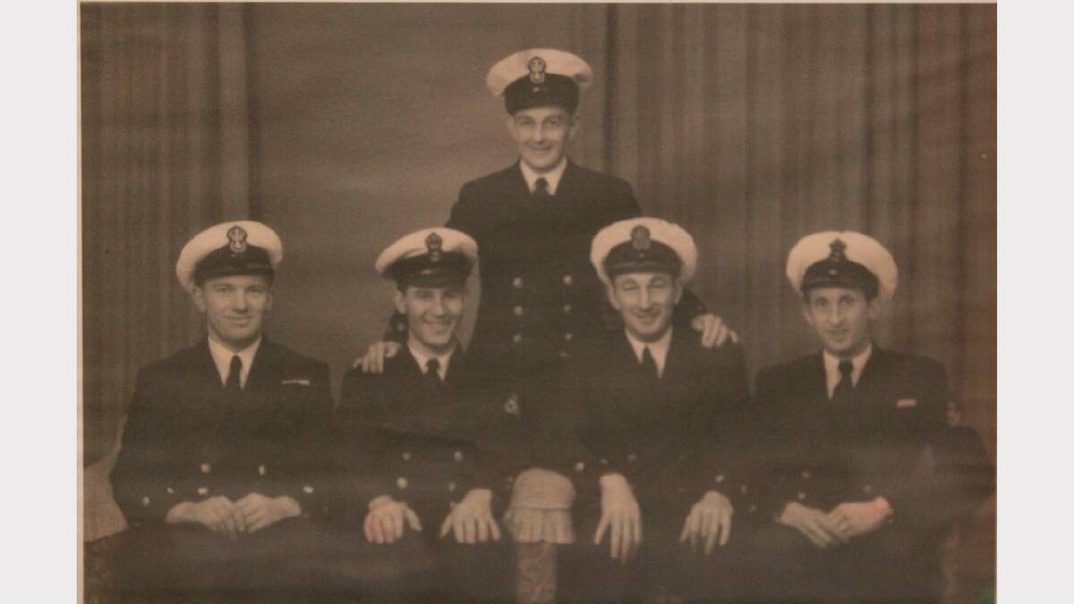  Mr Quinn, second from the left, was an engineer in the Australian Navy at the time, 