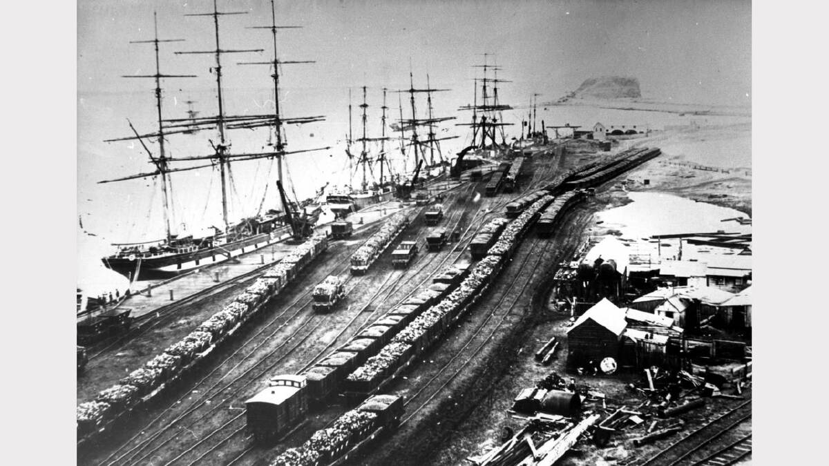 ARCHIVAL REVIVAL 1900s: Photographs from the Newcastle Herald's files. Newcastle's East End, looking east, towards the harbour entrance. The picture, probably from around 1900, shows coal loading at King's Wharf.