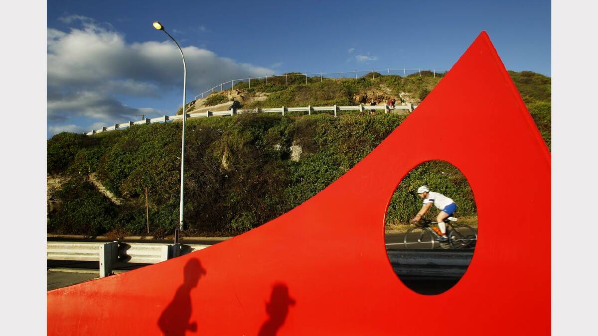 ENERGY: Action from the Sparke Helmore NBN Triathlon in Newcastle on Sunday. a competitor on Shortland Esplanade during the cycling leg of the Olympic Distance Triathlon race.  Picture Max Mason Hubers.