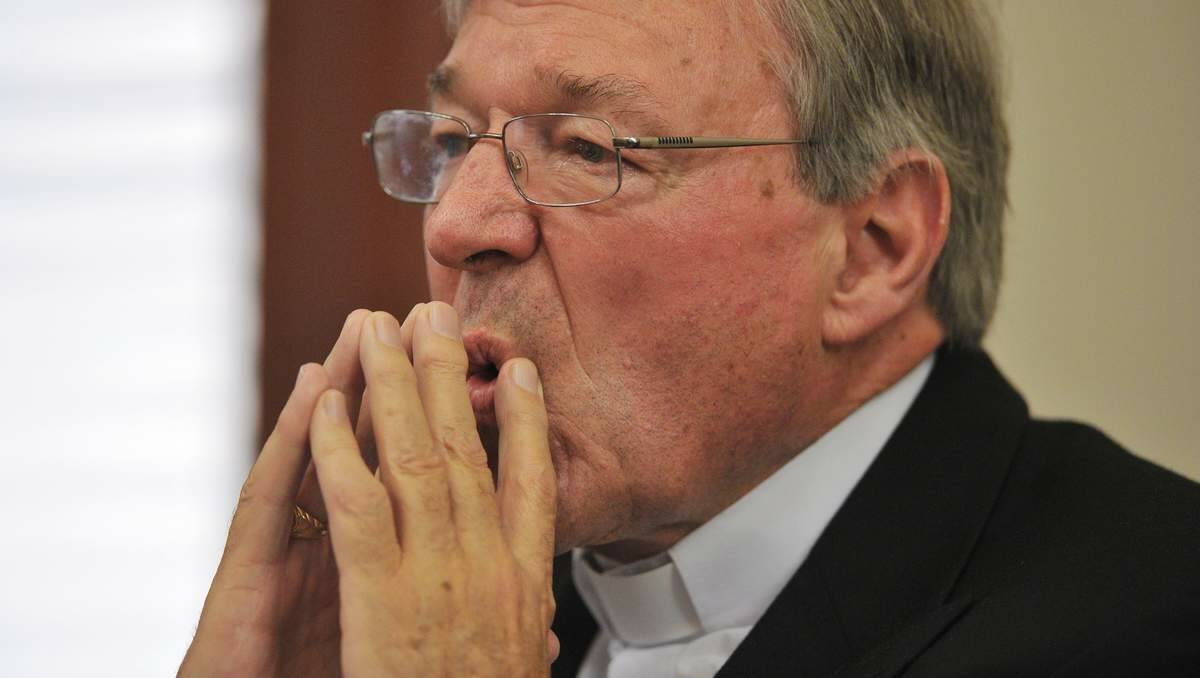 QUESTIONED: Cardinal George Pell at the Victorian parliamentary inquiry. There are now calls for his resignation.