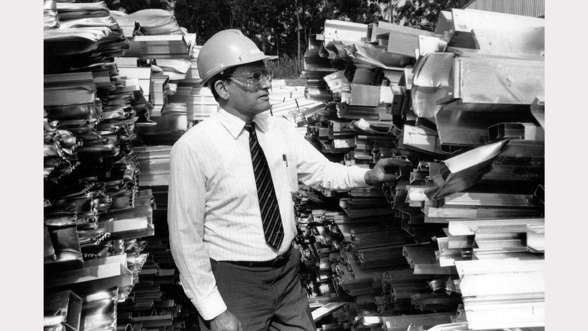 Alcan aluminium smelter acting works manager Malcolm Knight with scrap at the scrap recycling centre on April 28 1984. Picture: John Herrett  