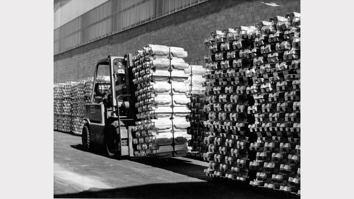 A view of a stockpile of primary aluminium ingots awaiting shipment at Alcan Australia Limited's Kurri Kurri smelter.  