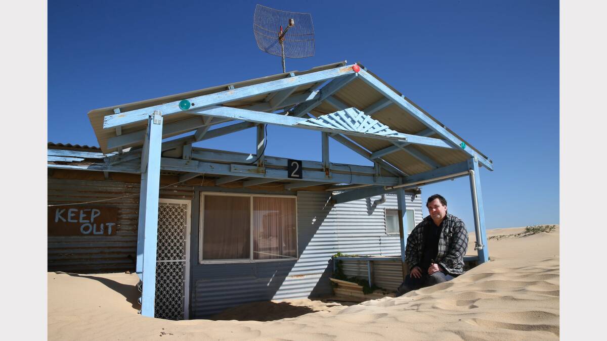 NCH NEWS Worimi Conservation Lands Stockton Bight Stockton Beach update Picture shows Tin City Hut owner Darren Stuart 5th August 2013 NCH NEWS Picture by DEAN OSLAND