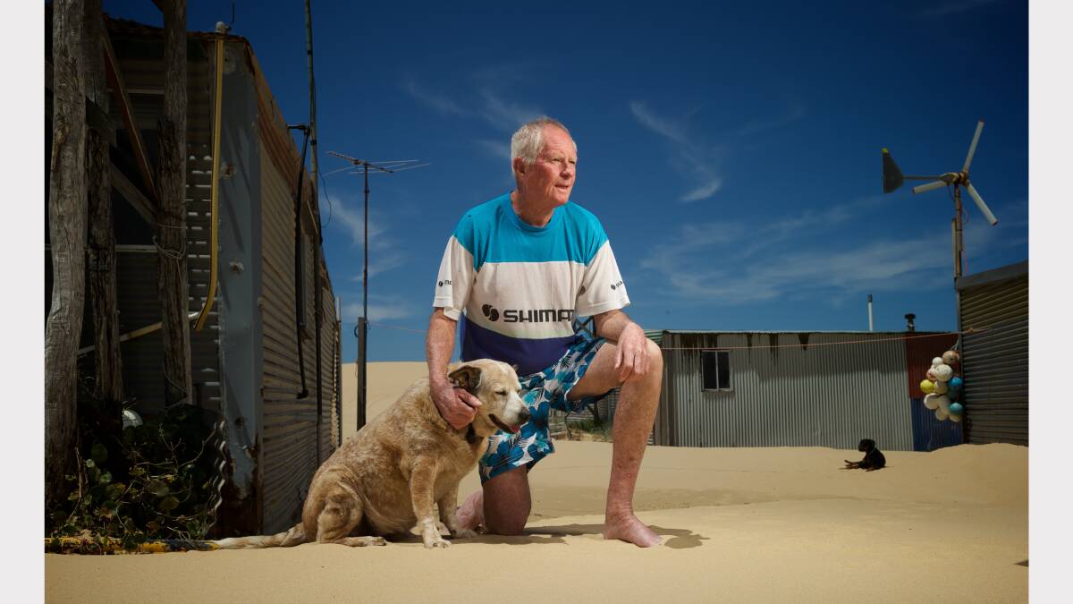 Former iron worker 66yo Alwyn Garland outside his hut at Tin City, Stockton Beach. 2nd December 2013 Photo: Wolter Peeters The Sydney Morning Herald