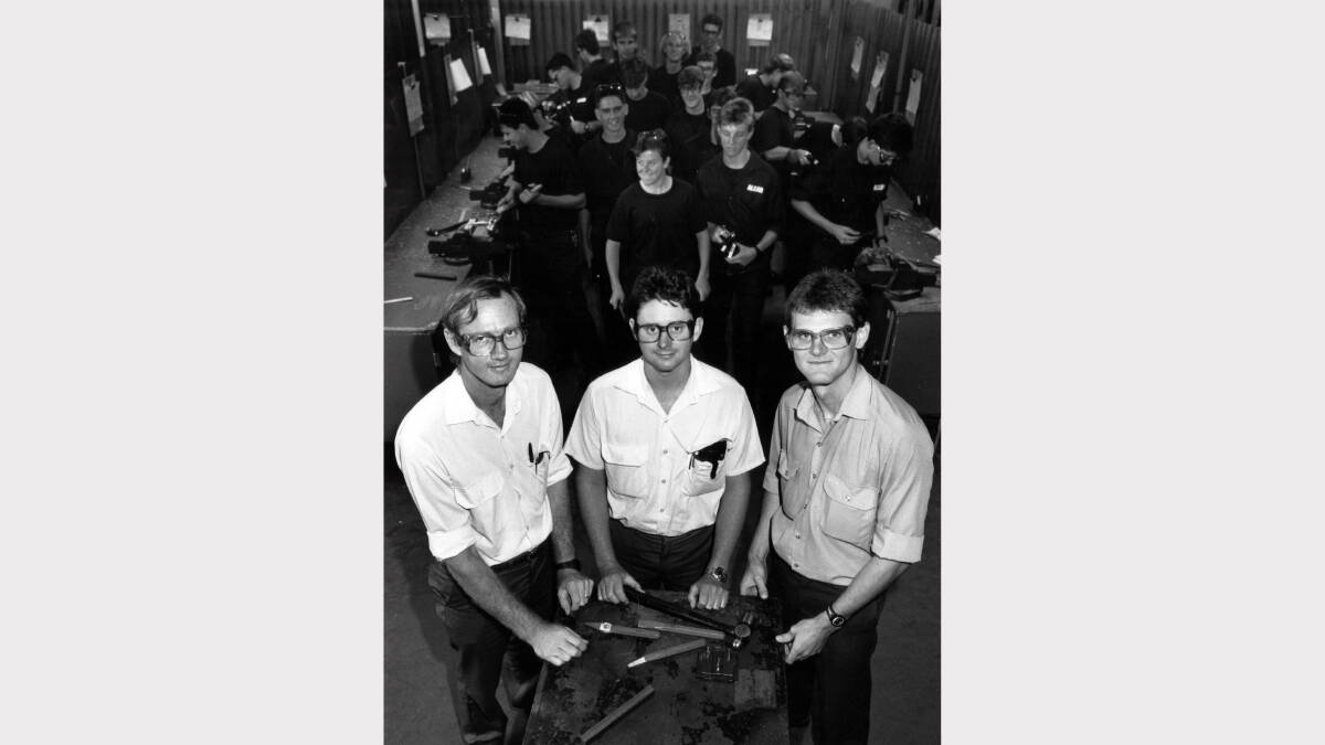 Alcan aluminium smelter Kurri Kurri - apprentice training officers Graham Perry, Greg Tweedie and Mark Bower with apprentice fitter and turners in the background on January 17, 1991. Picture  Eddie Cross