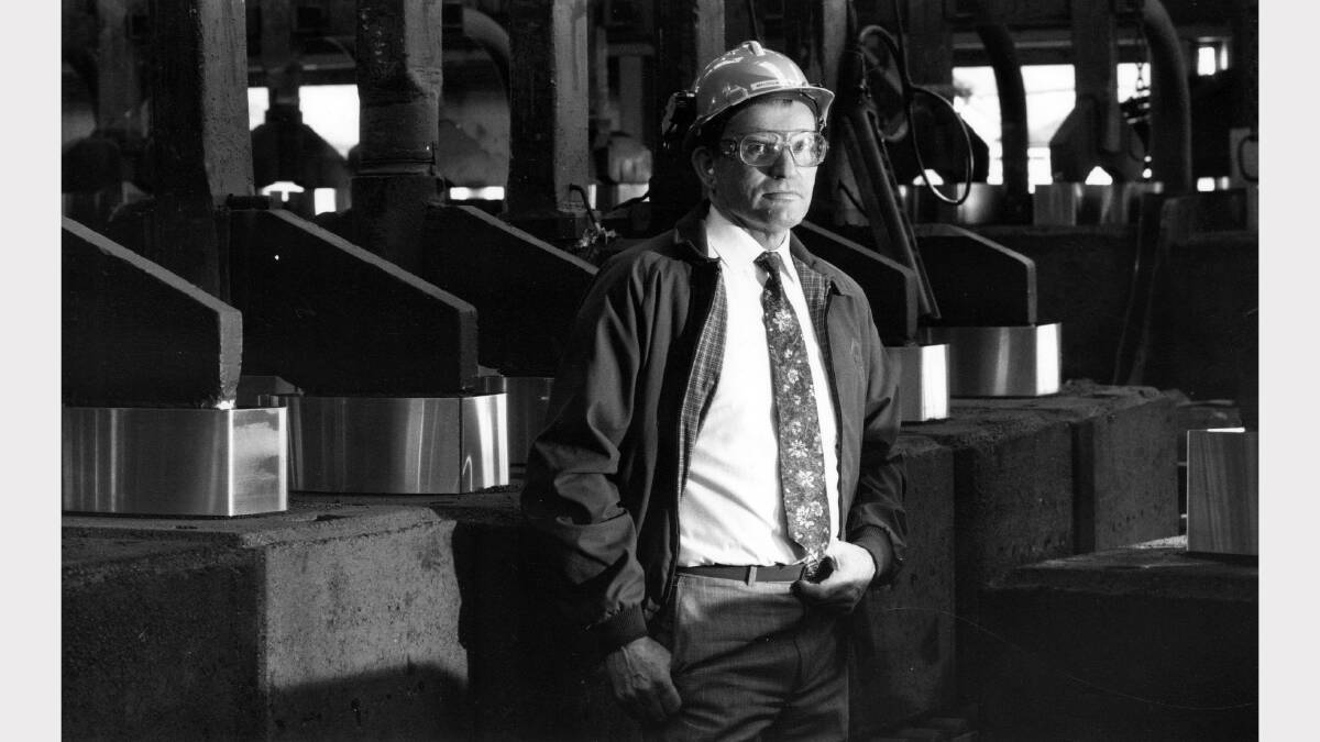 Alcan aluminium smelter Kurri Kurri acting works manager Malcolm Knight with some of the carbons. Alcan announces a $20 million upgrade of the plant. 31 March 1994 pic Waide Maguire.  