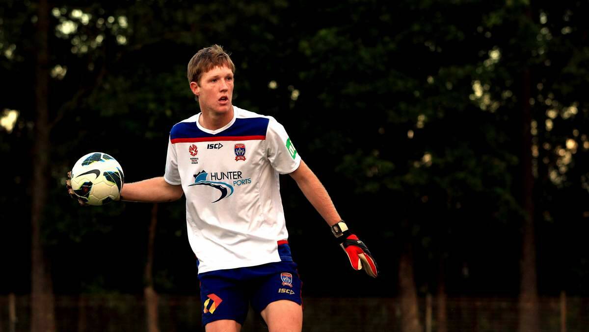 SAFE HANDS: Adam Pearce at Jets Youth training yesterday.  Picture: Simone De Peak