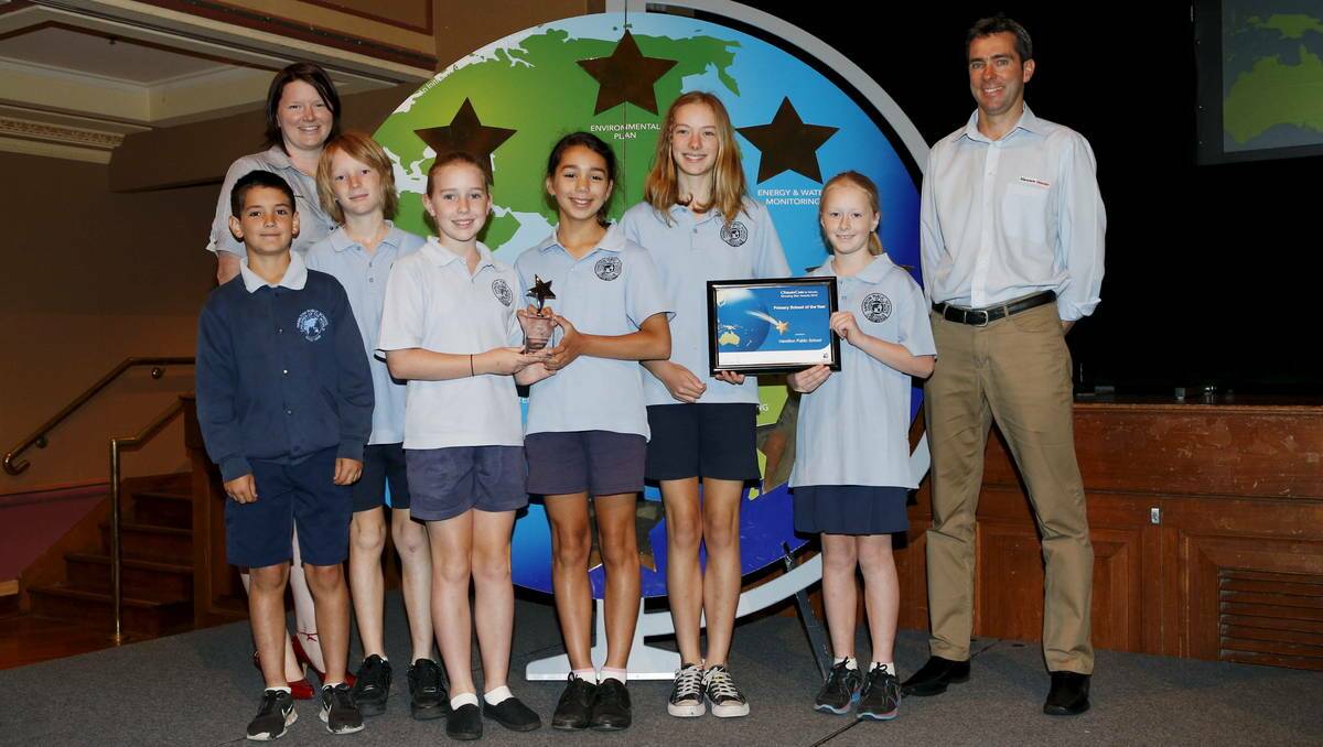 ECO WARRIORS: Students from ClimateCam Primary School of the Year, Hamilton Public School, with program sponsors Laura Harkins, Community Relations Specialist, Port Waratah Coal Services, and Rob Cooper, communications manager, Macquarie Generation. 
