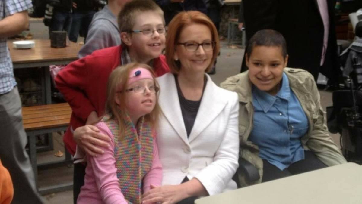 SUPPORT: Prime Minister Julia Gillard meets disability groups at Parliament House in Canberra yesterday.