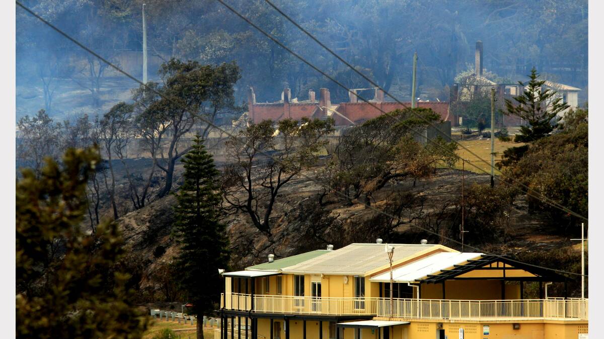 Scenes from the fires at Catherine Hill Bay and Chain Valley Bay on Friday. Photo by Simone De Peak