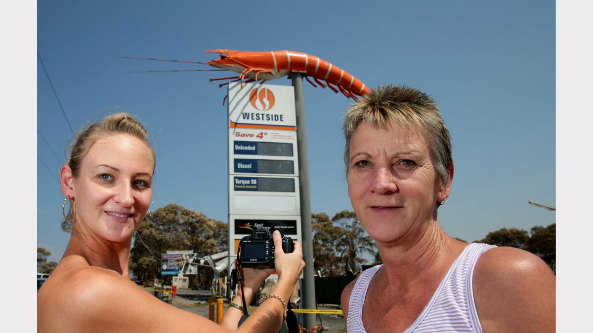 SNAPPED:  Kelly Kucherenko and Lynn Potter photograph  the Big Prawn yesterday. Pictures: Ryan Osland