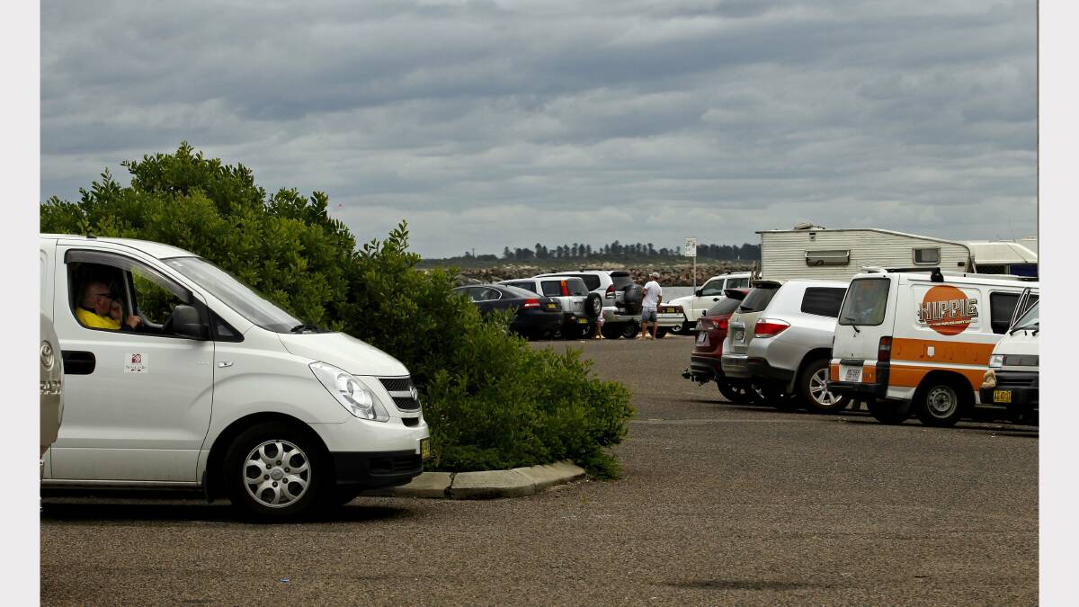 PITCHED: The bush regeneration area and the car park off Horseshoe beach have been overrun with campers. Pictures: Simone De Peak