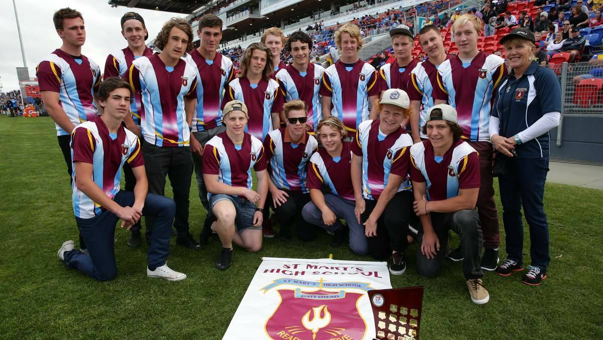 TRIUMPH: Annette Morgan  with the victorious St Mary’s High School  team.  Pictures: Ryan Osland